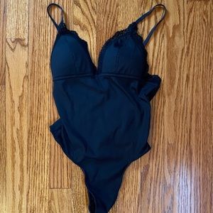 Black Bodysuit with a Lace Trim